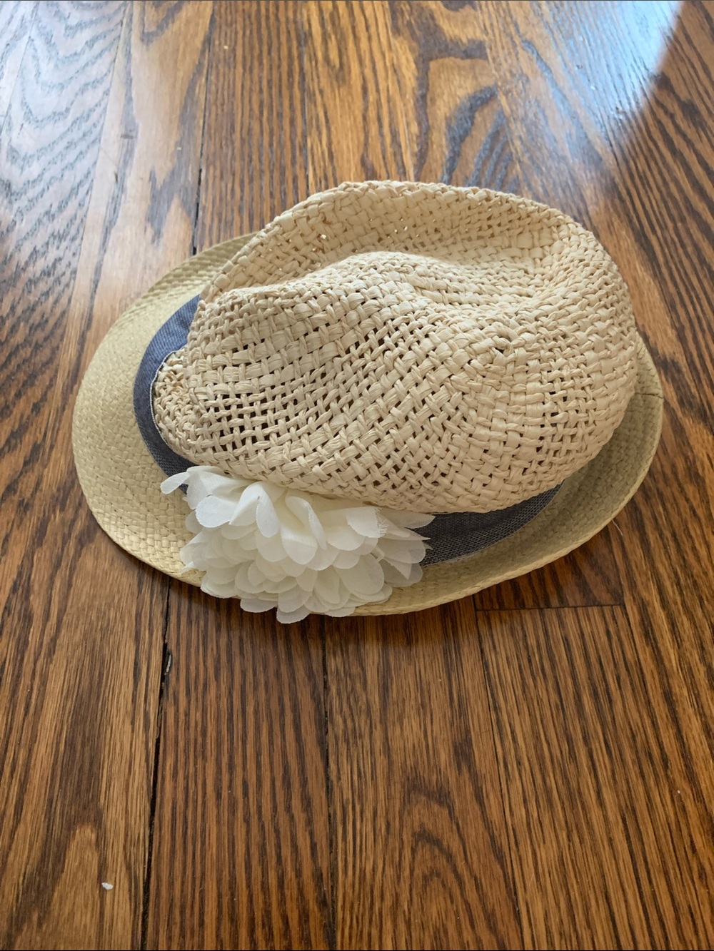 Ruffle Butts Straw Sun Hat with Navy Band and White Flower